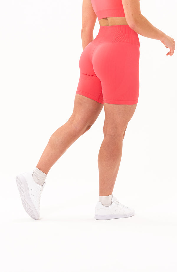 V3 Apparel Women's seamless Limitless high waisted cycle shorts in coral pink – Squat proof 5 inch inseam leg bum enhancing shorts for Gym workouts training, Running, yoga, bodybuilding and bikini fitness.