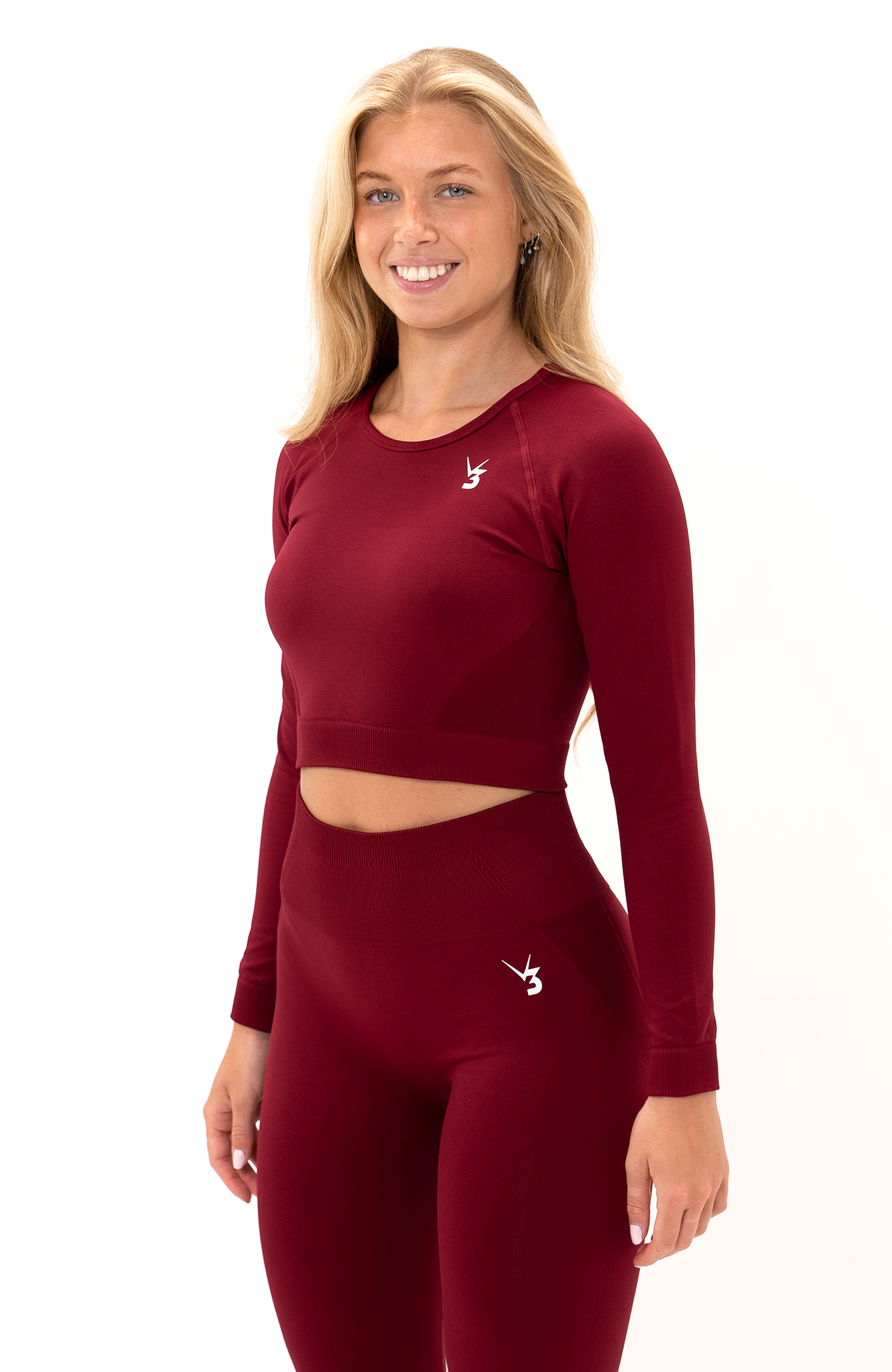 V3 Apparel Women's Tempo seamless long sleeve cropped training top in burgundy red with thumb hole long sleeves and crop fit for gym workouts training, Running, yoga, bodybuilding and bikini fitness.