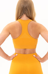 V3 Apparel Women's seamless Limitless training sports bra in orange with removable padded cups and strap for gym workouts training, Running, yoga, bodybuilding and bikini fitness.