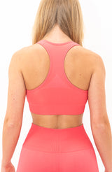 V3 Apparel Women's seamless Limitless training sports bra in coral pink with removable padded cups and strap for gym workouts training, Running, yoga, bodybuilding and bikini fitness.