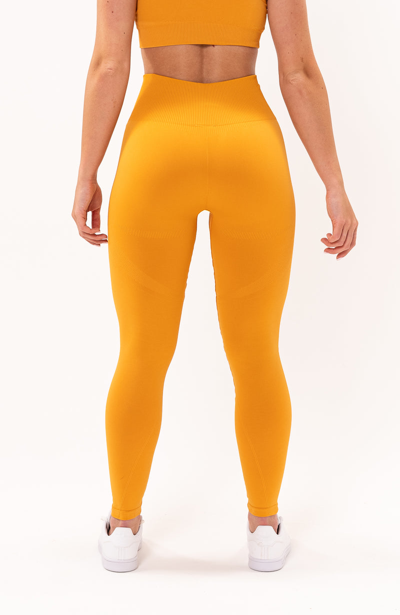 V3 Apparel Women's seamless Limitless bum shaping, high waisted leggings in orange – Squat proof sports tights for Gym workouts training, Running, yoga, bodybuilding and bikini fitness.