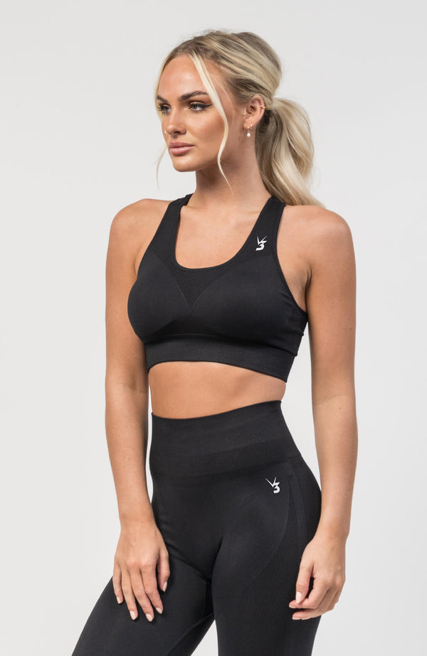 V3 Apparel Women's seamless Excel training sports bra in black with removable padded cups and straps for gym workouts training, Running, yoga, bodybuilding and bikini fitness.