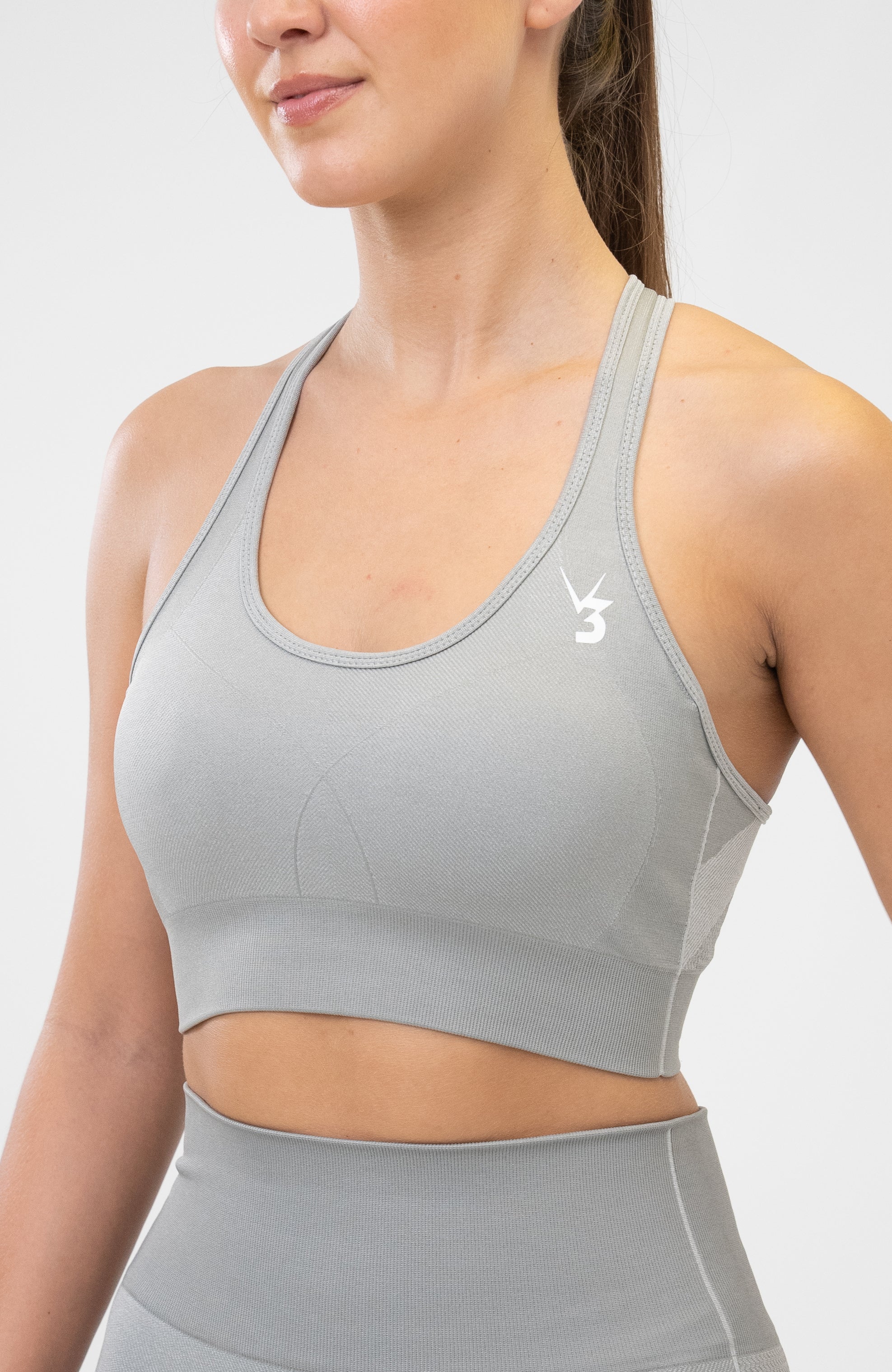 V3 Apparel Women's seamless Unity training sports bra in grey with removable padded cups and strap for gym workouts training, Running, yoga, bodybuilding and bikini fitness.