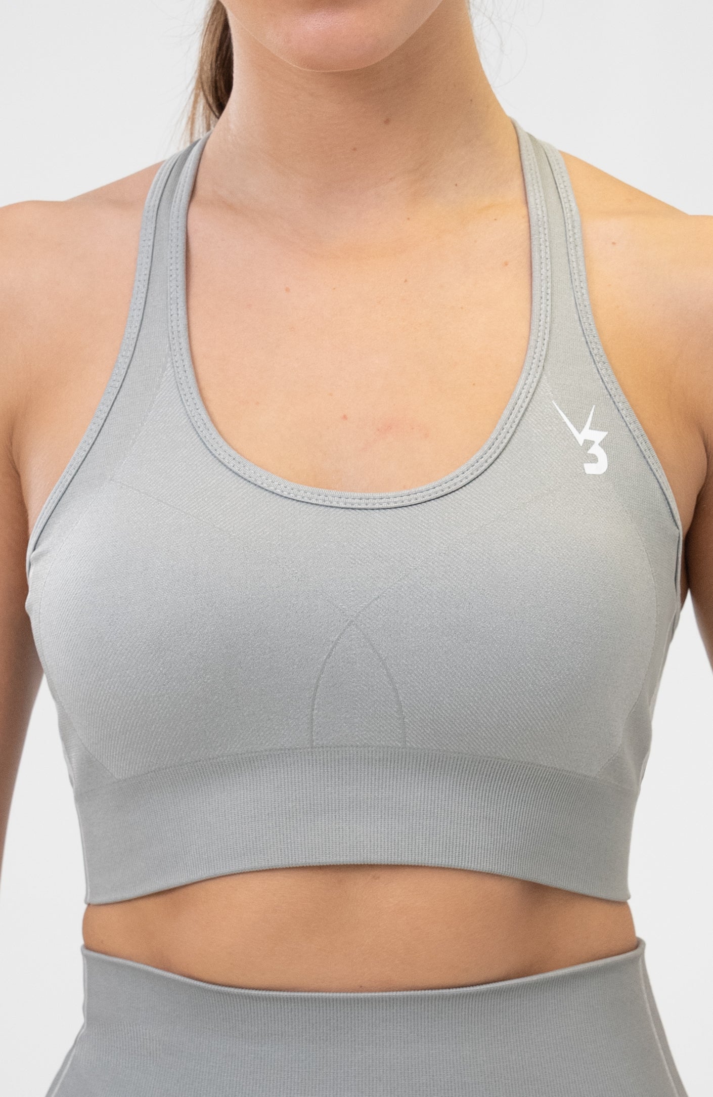 V3 Apparel Women's seamless Unity training sports bra in grey with removable padded cups and strap for gym workouts training, Running, yoga, bodybuilding and bikini fitness.