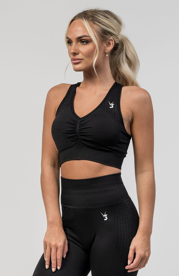 V3 Apparel Women's seamless Empower training sports bra in black with removable padded cups and strap for gym workouts training, Running, yoga, bodybuilding and bikini fitness.